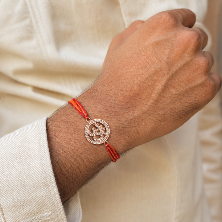 Spiritual Om Symbol Rose Gold Plated CZ Red Orange Thread Rakhi For Men