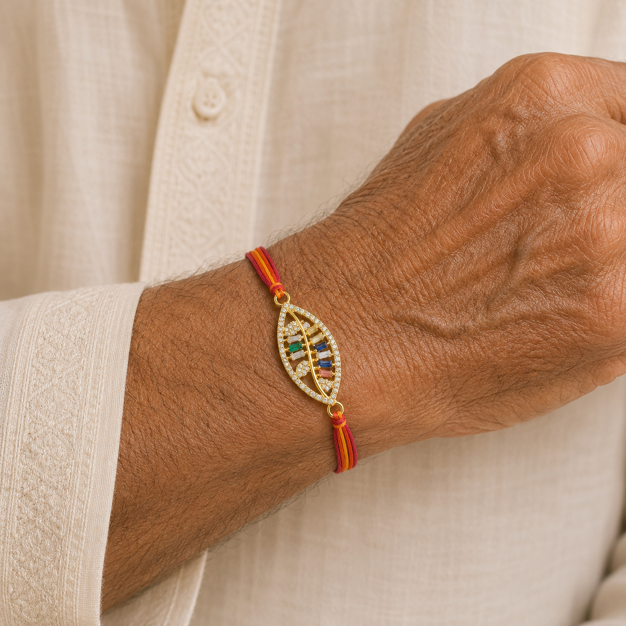 Designer Leaf Style Gold Plated CZ Red Orange Thread Rakhi For Men