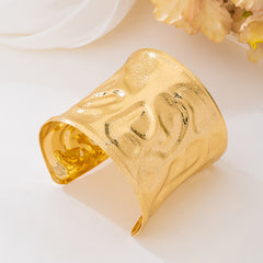 Designer Wide Textured Gold Plated Plain Alloy Bracelet For Women