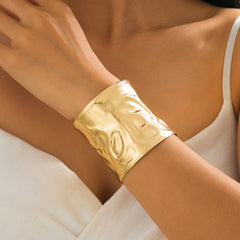 Designer Wide Textured Gold Plated Plain Alloy Bracelet For Women