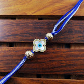 Flower Evil Eye Gold Cubic Zirconia Thread Rakhi For Men