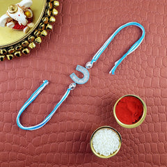 Horse Shoe Silver Sky Blue American Diamond Crystal Thread Rakhi