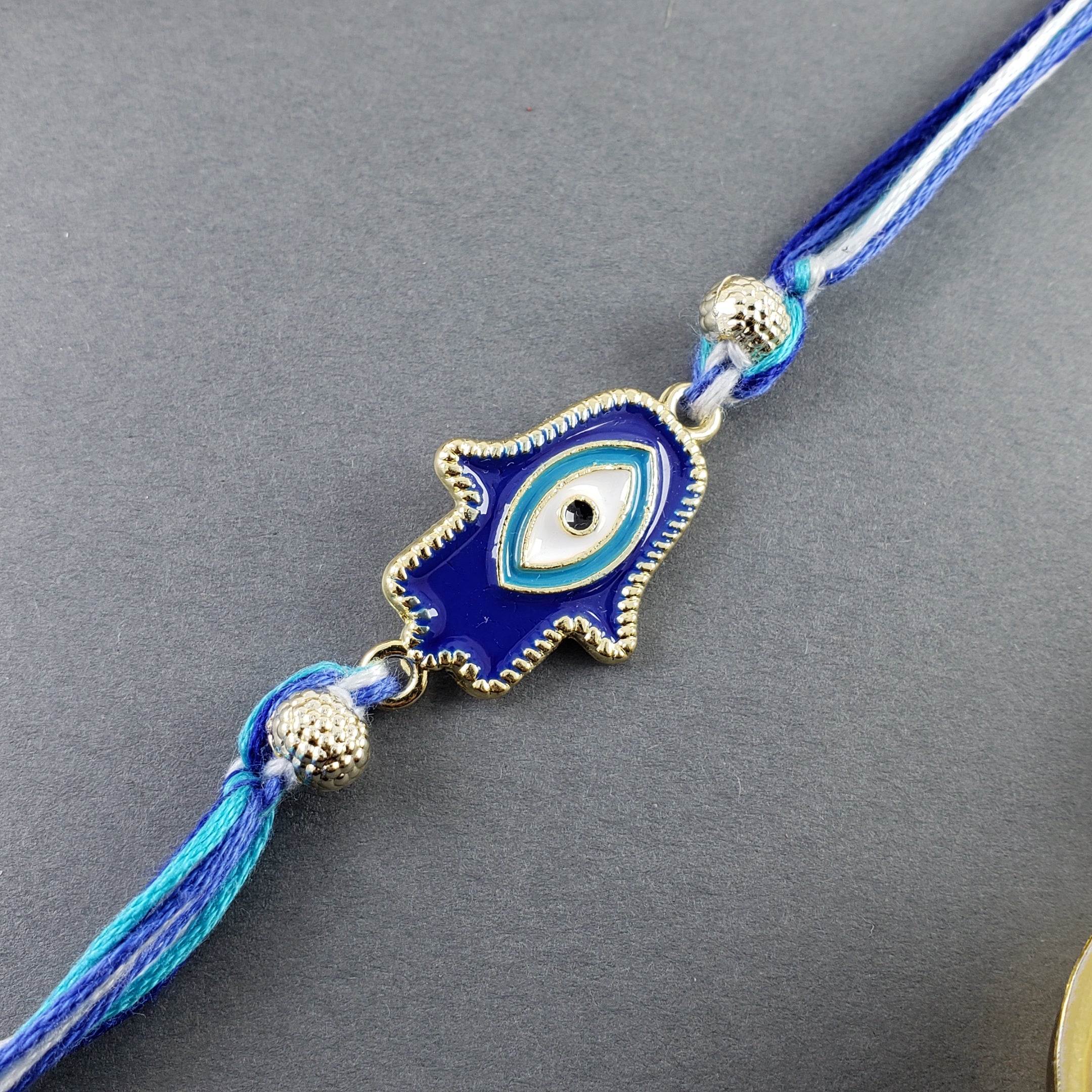 Hamsa Evil Eye Enamel Blue White Gold Thread Rakhi For Men
