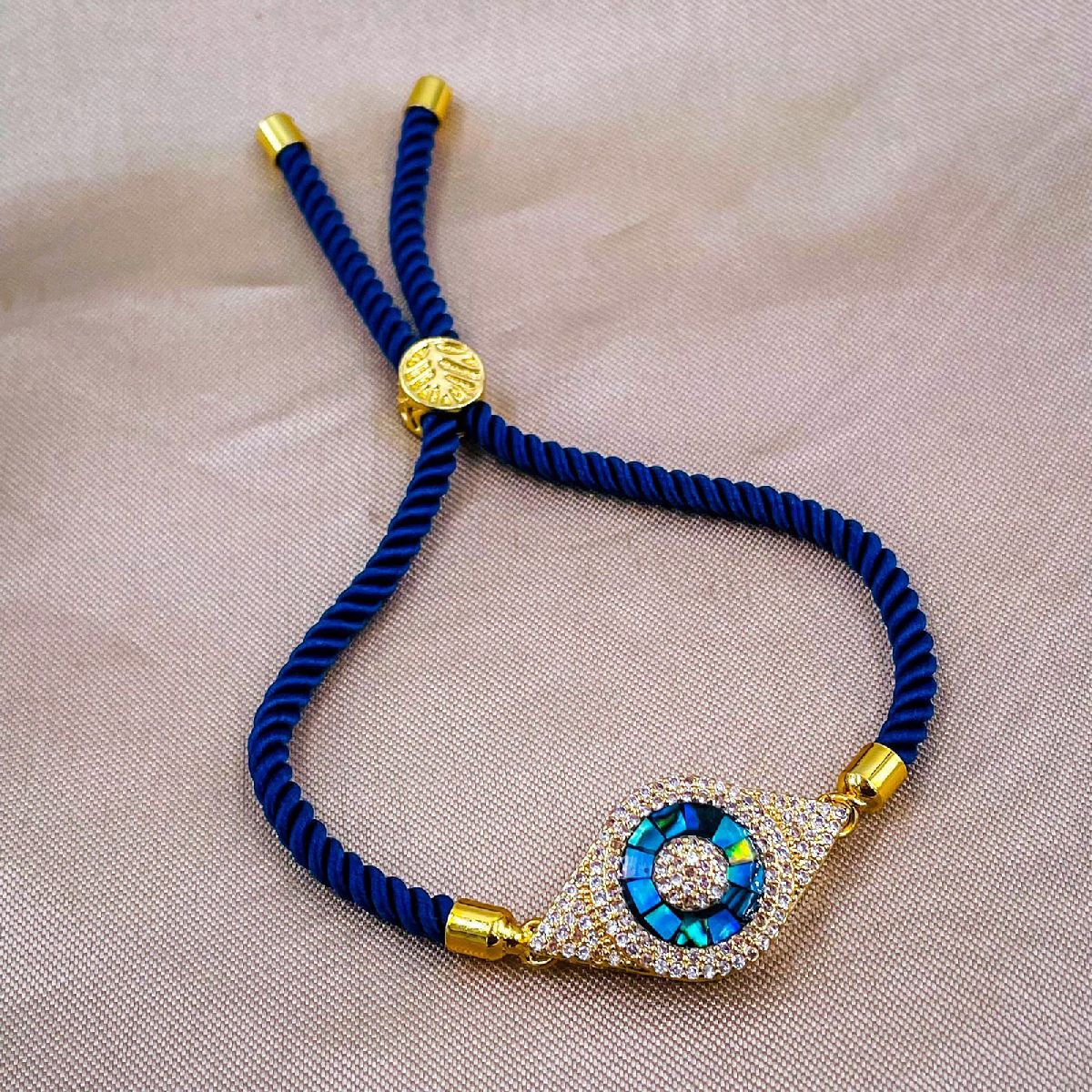 Evil Eye American Diamonds Gold Blue Copper Thread Slider Bracelet For Women