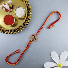 Spiritual Om Symbol Rose Gold Plated CZ Red Orange Thread Rakhi For Men