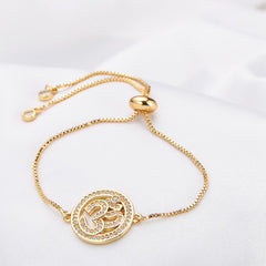 Aum Om 18K Gold Cubic Zirconia American Diamond Slider Tennis Bracelet