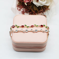 Elegant Rose Gold Bracelet With Red Crystals And Green Leaves