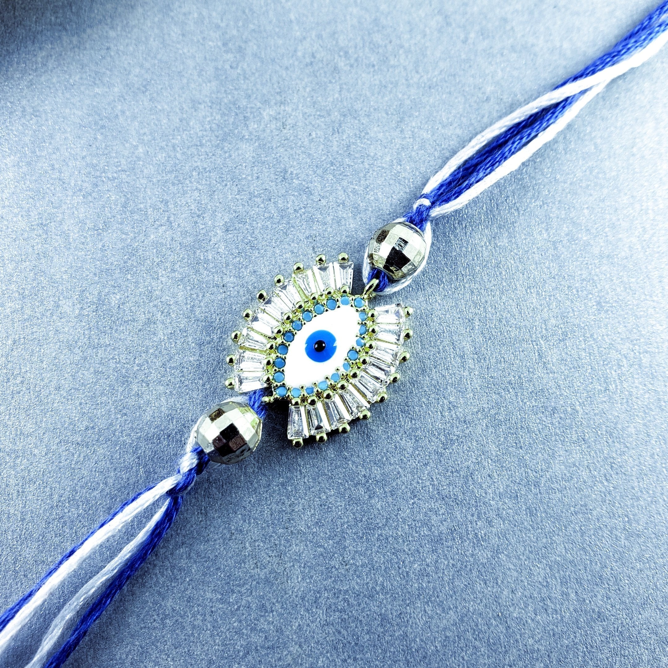 Evil Eye Blue Silver Cubic Zirconia Thread Rakhi For Men