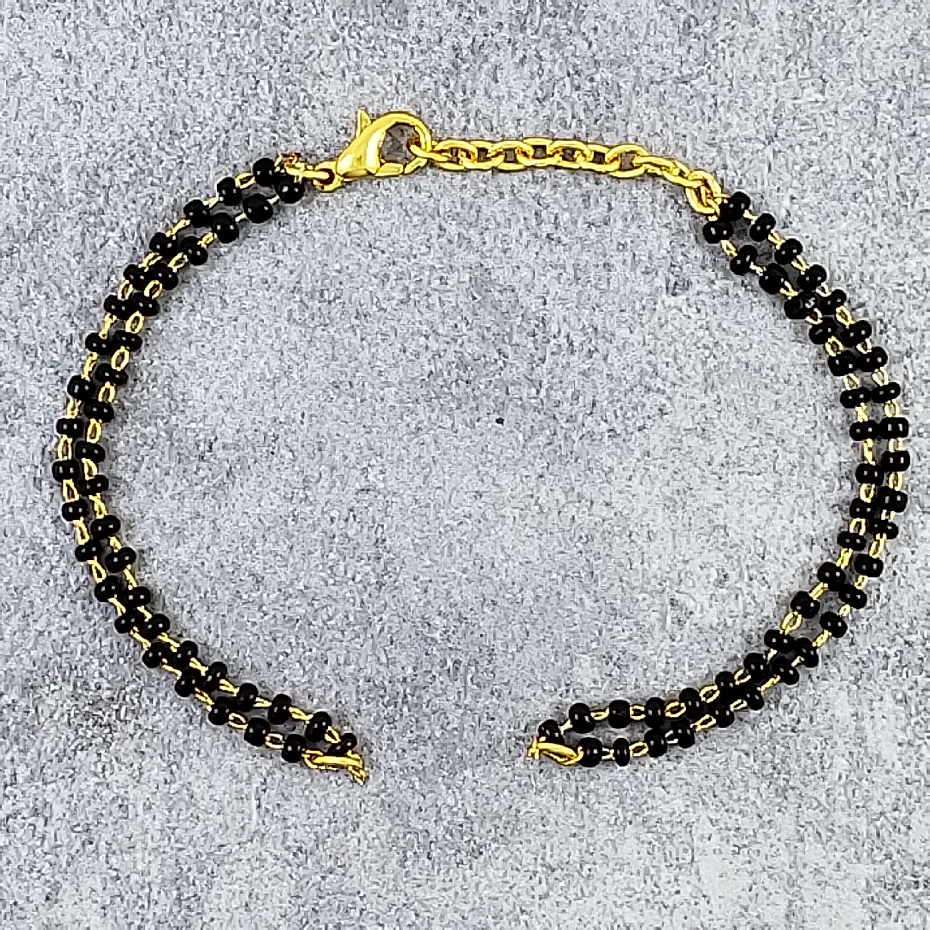 Buy Navgreh Kale Moti Black Stone Bracelet at Amazon.in-chantamquoc.vn