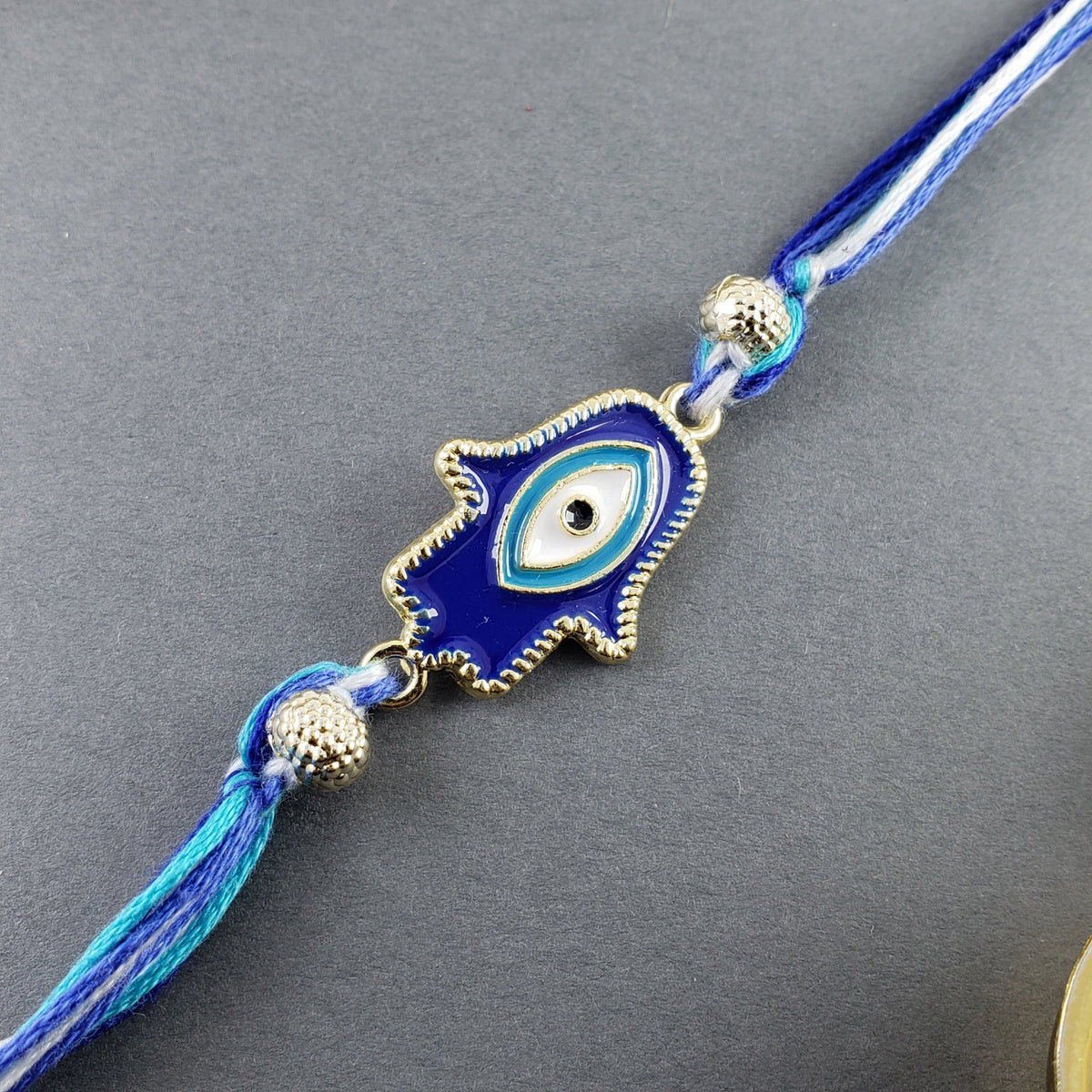 Hamsa Evil Eye Enamel Blue White Gold Thread Rakhi For Men