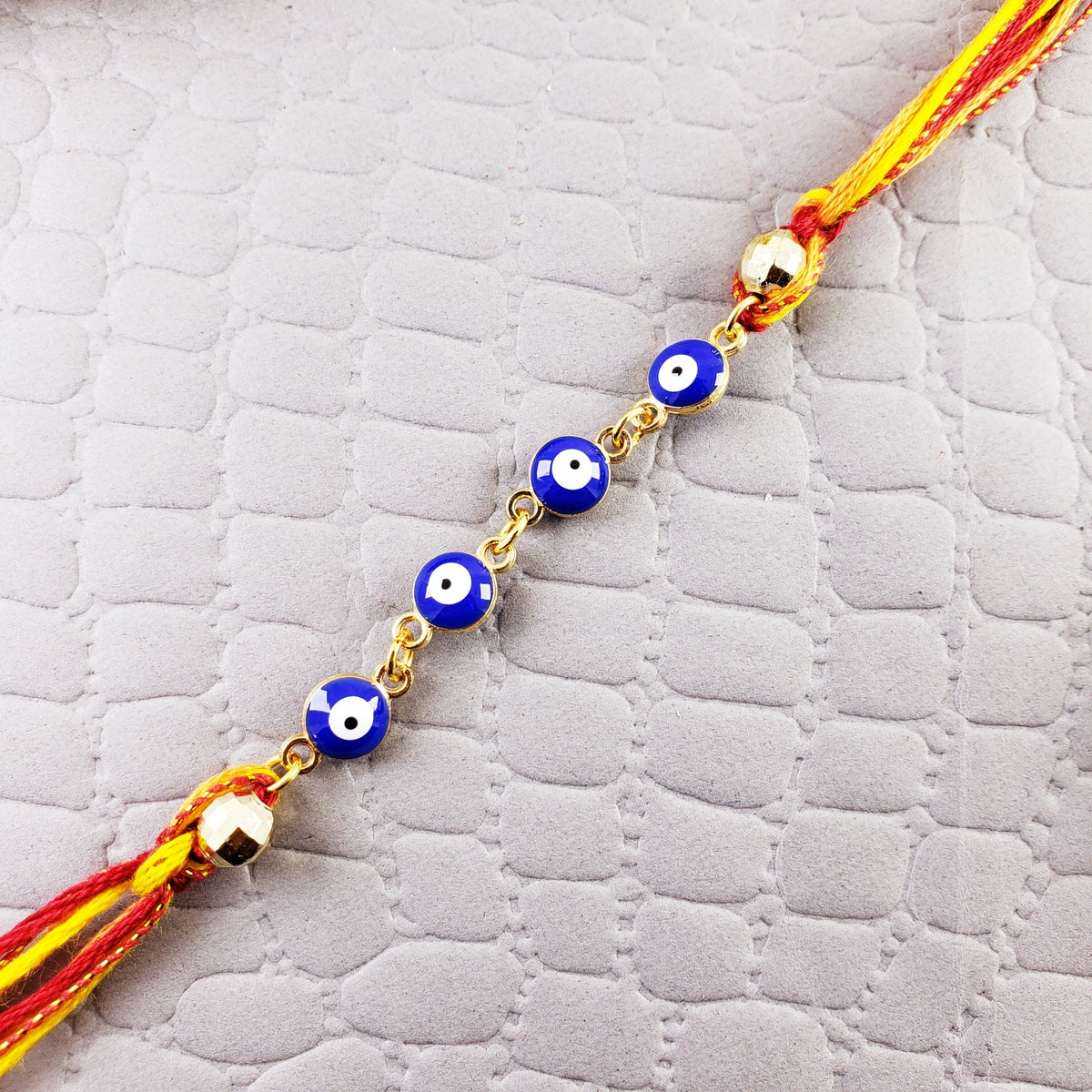 Evil Eye Gold Blue Enamel Thread Rakhi For Men
