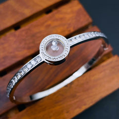 Dancing Zircons in Space 18K Gold Stainless Steel Openable Kada bangle for Women