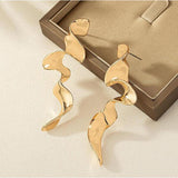 Twisted Waves Glossy 18K Gold Anti Tarnish Long Dangling Earring For Women
